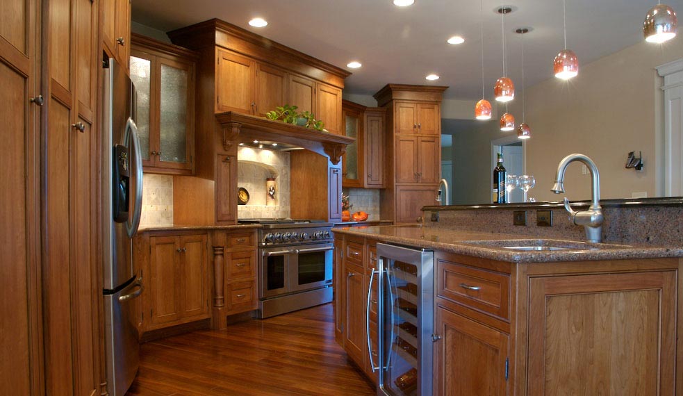Contemporary Kitchen with Long Island Behind Bar