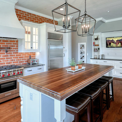 Farmhouse kitchen with brick backsplash